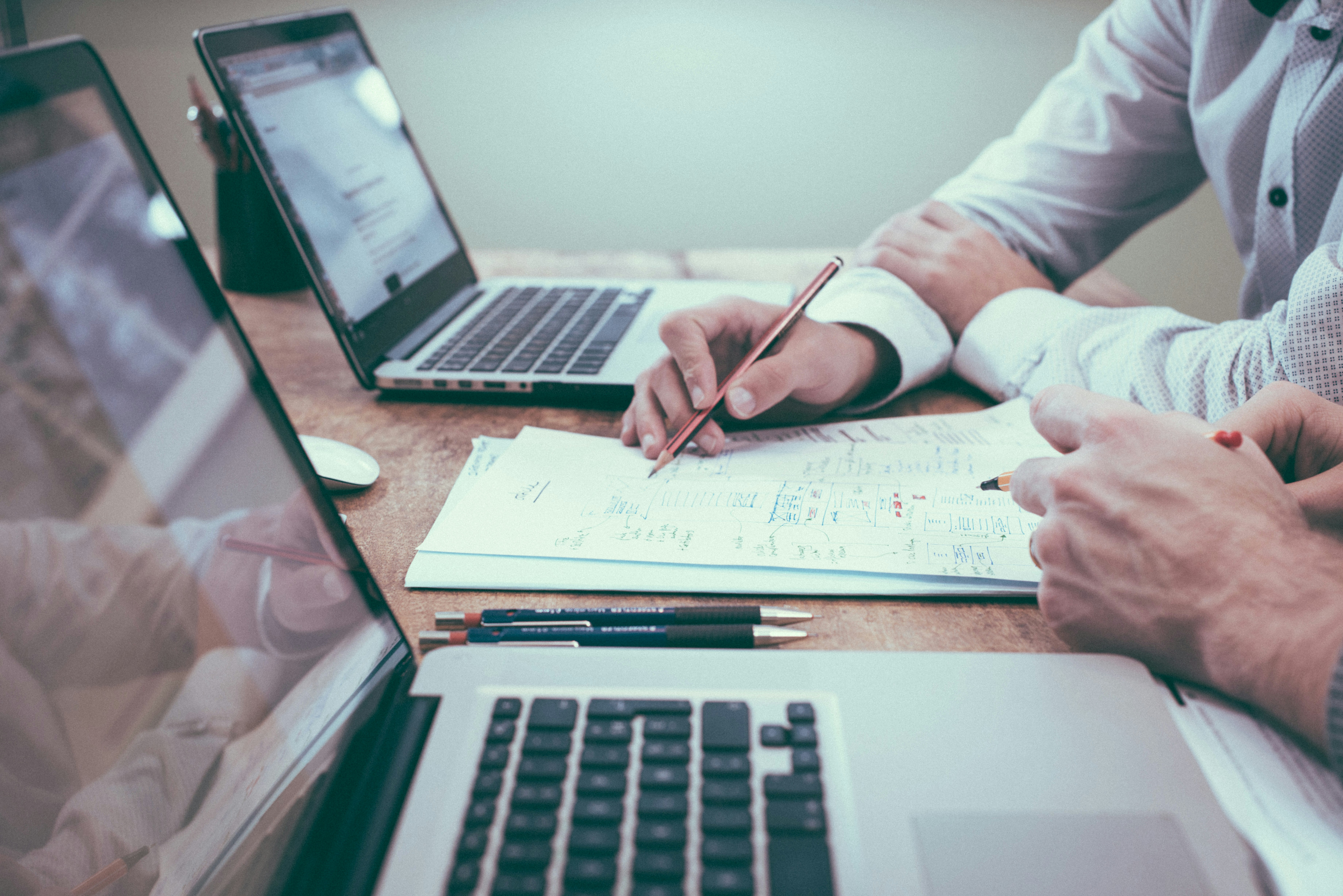 Financial advisers outsourcing paraplanning support on laptop