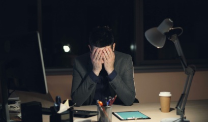 Financial adviser reviewing workload - deciding when to outsource paraplanning to improve efficiency